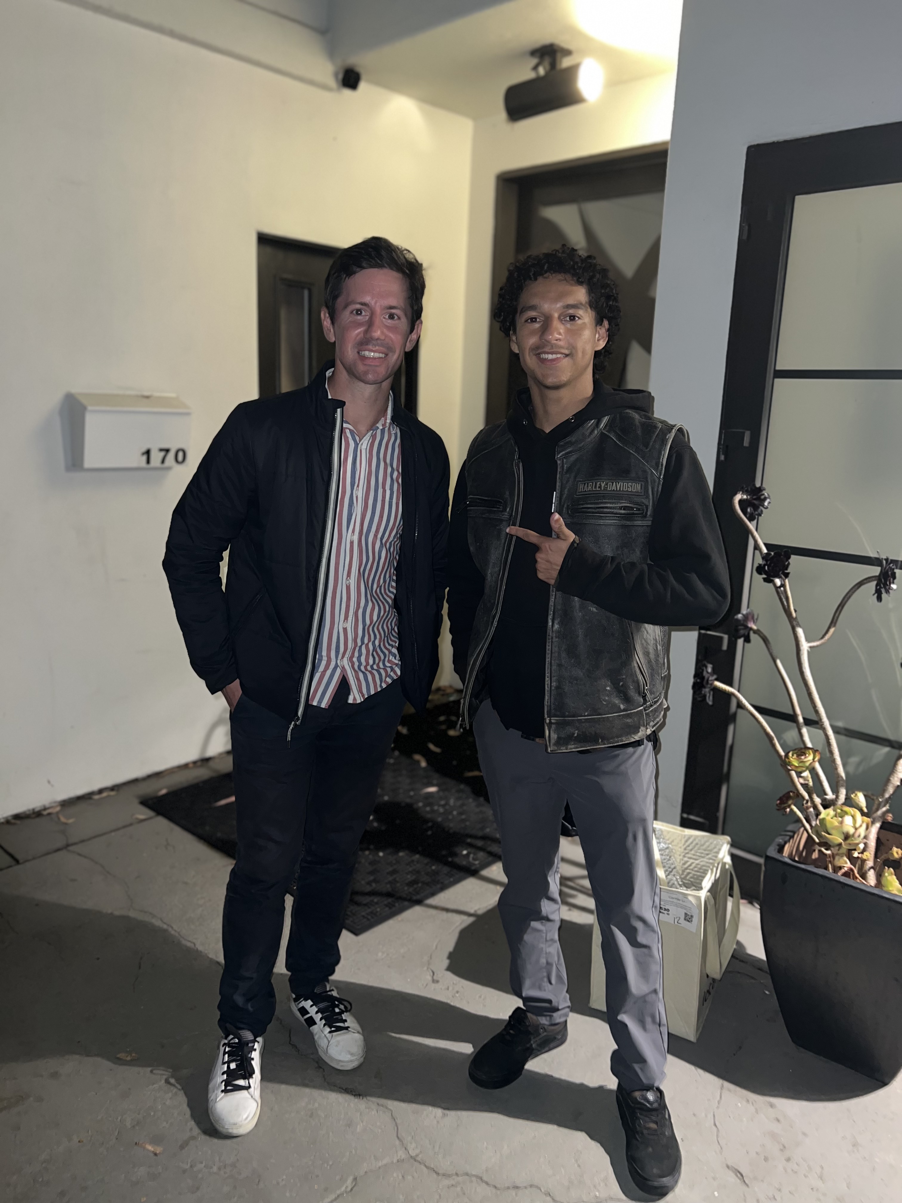 Attendees gathered together at an OpenAI hackathon event