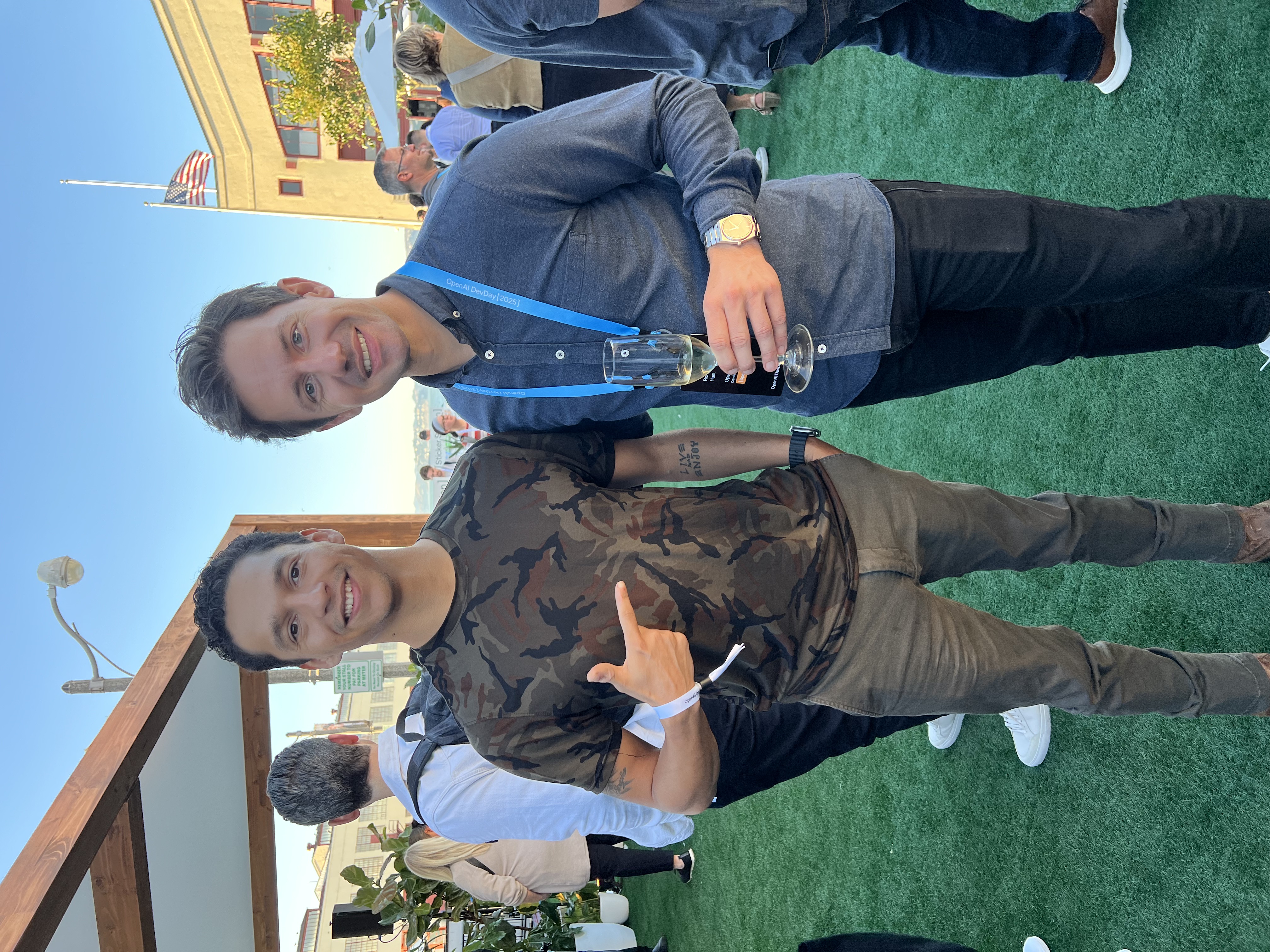 Attendees sharing a moment at an OpenAI developer event